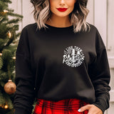 a woman with grey hair wearing a black sweatshirt