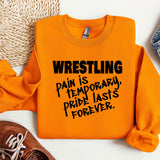 a pair of sneakers and a sweatshirt with the words wrestling on it