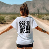 a woman walking down a road with her arms outstretched