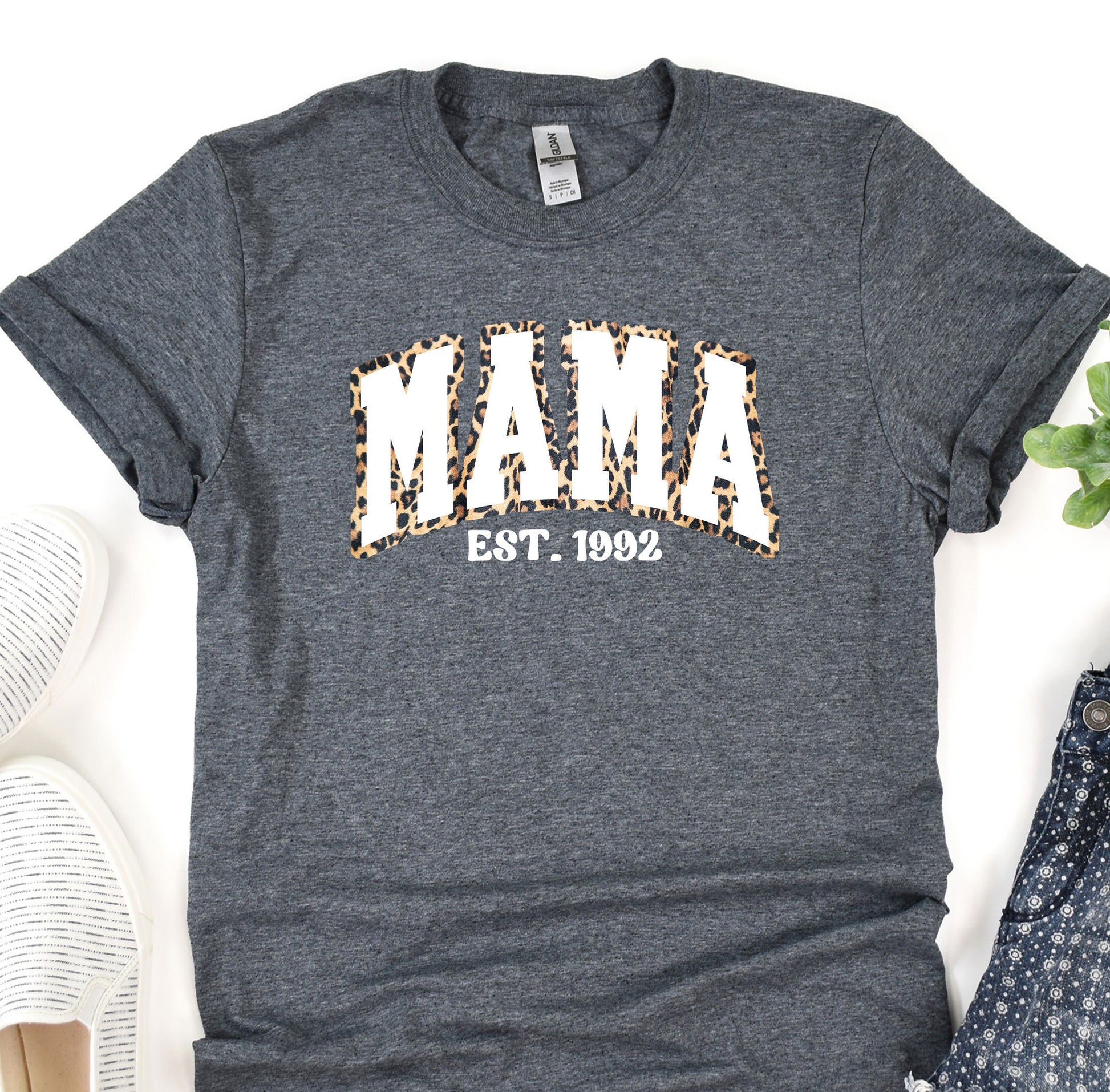 a t - shirt with the word mama on it