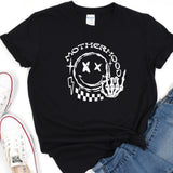 a black t - shirt with a checkered design on it