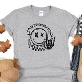 a t - shirt with the words motherhood on it