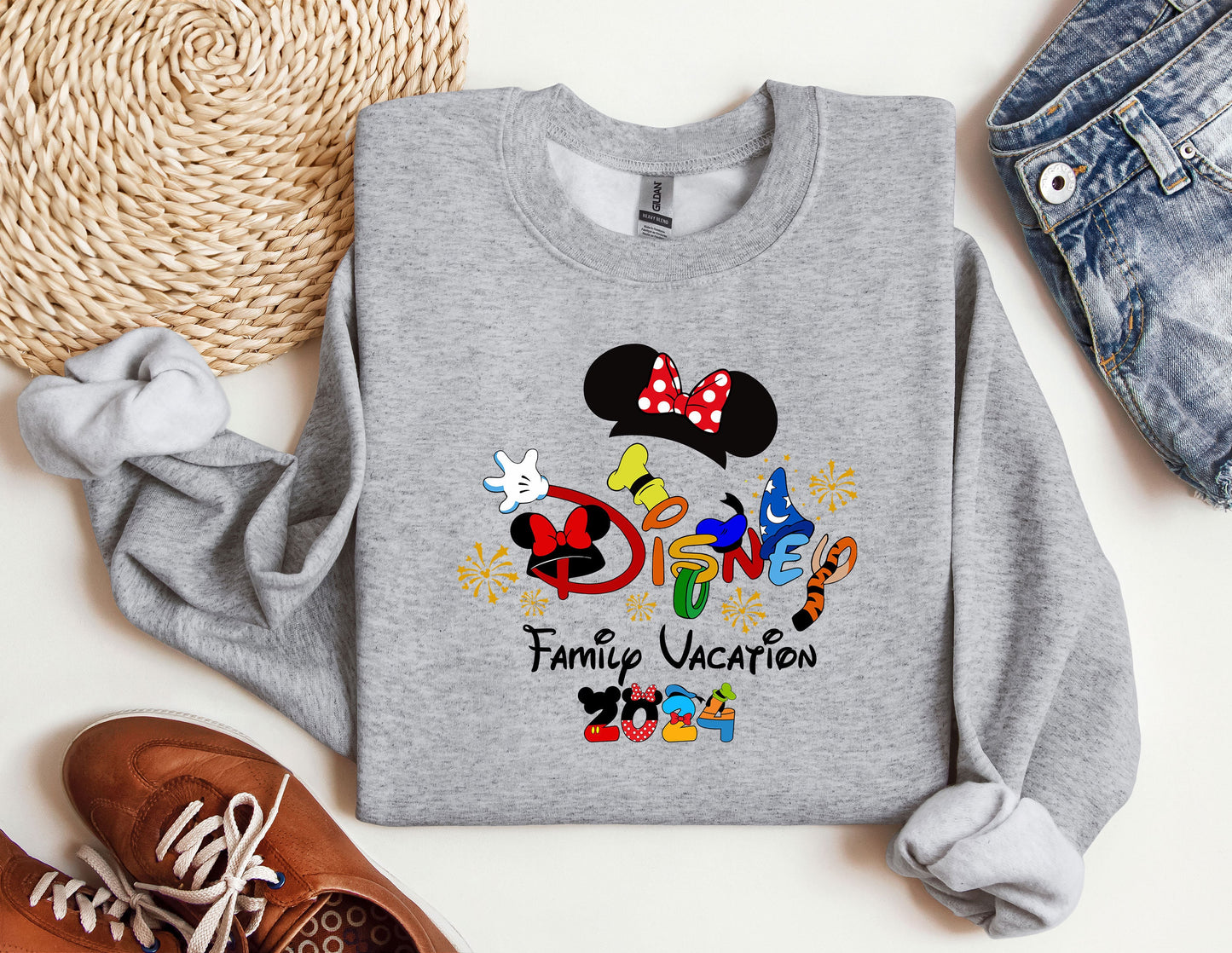 a mickey mouse family vacation shirt next to a pair of shoes