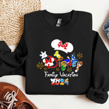 a mickey mouse family vacation shirt next to a pair of sneakers