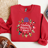 a red sweatshirt with a mickey mouse design on it