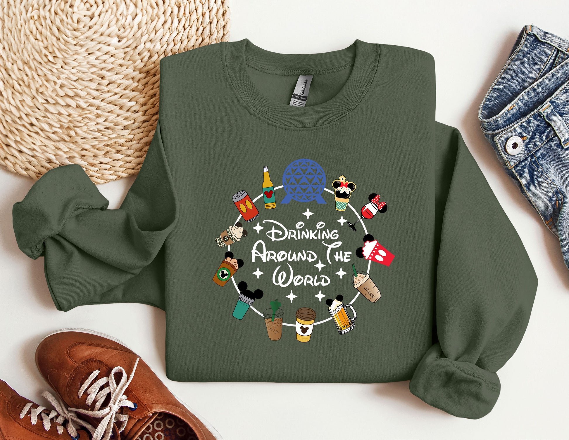 a green sweatshirt with the words drinking around the world printed on it