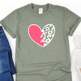 a t - shirt with a heart and lightning bolt on it