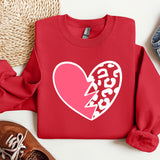 a red sweatshirt with a heart and lightning bolt on it
