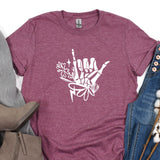 a t - shirt with a hand drawn design on it