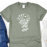 a t - shirt that has a picture of a hand of cards on it