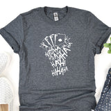 a t - shirt that has a picture of a person's face on it