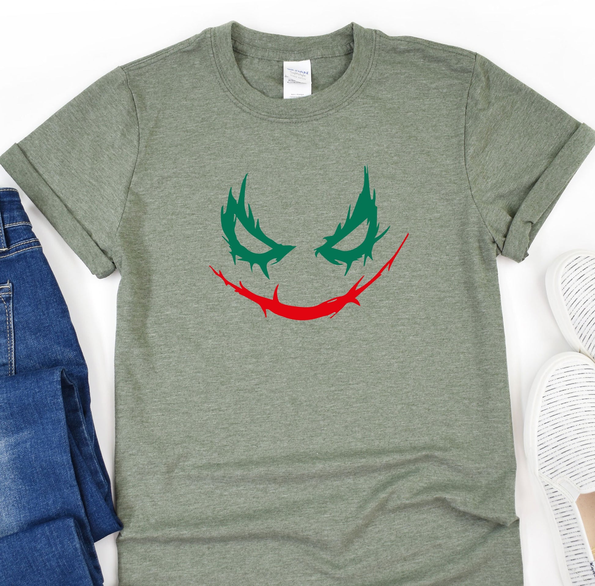 a t - shirt with a joker face painted on it