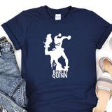 a t - shirt with a picture of a man holding a baseball bat