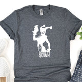 a t - shirt with a picture of a man holding a baseball bat