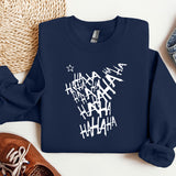a blue sweatshirt with white writing on it next to a pair of shoes