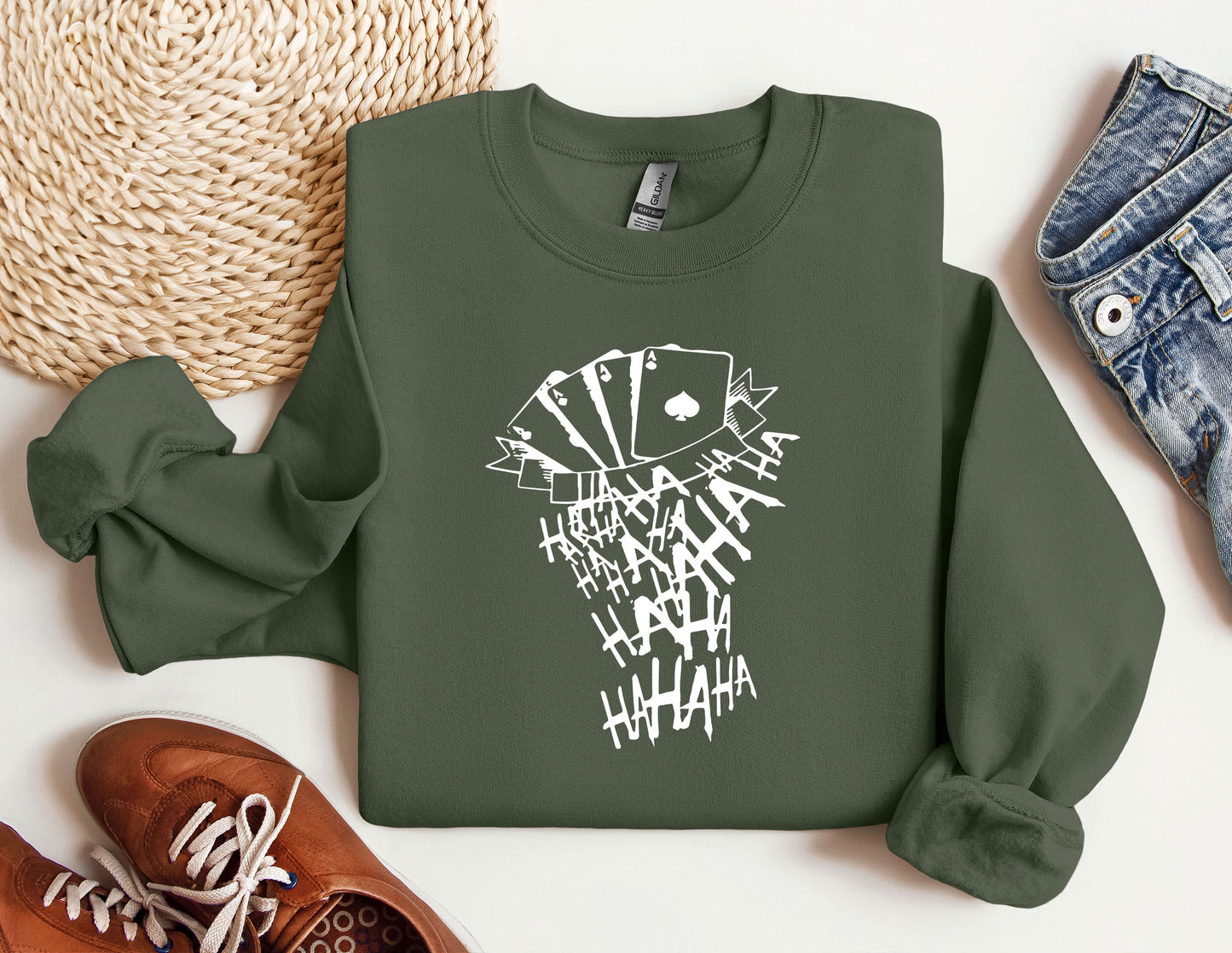 a green sweatshirt with white writing on it