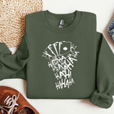 a green sweatshirt with white writing on it