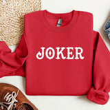 a red sweater with the word joker printed on it