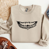 a sweater with a smile drawn on it