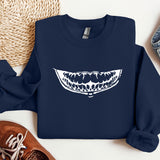 a blue sweatshirt with an image of a mouth on it