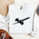 a white shirt with a black sword on it