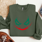 a green sweatshirt with a red and green face on it