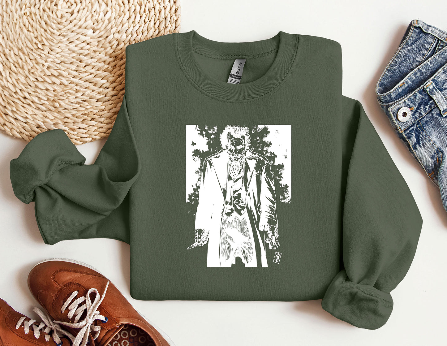 a green sweatshirt with a picture of a man on it