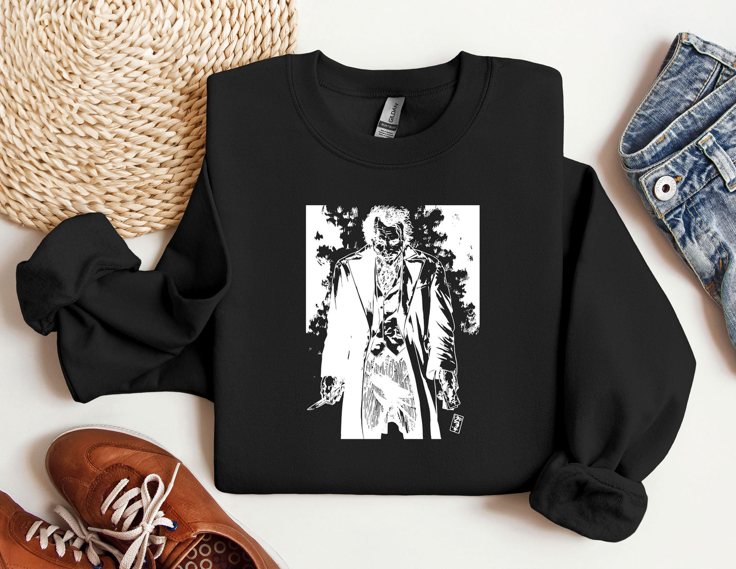 a black sweatshirt with a picture of a man and a woman