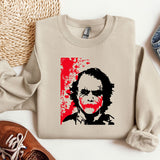 a sweater with a picture of a man's face on it