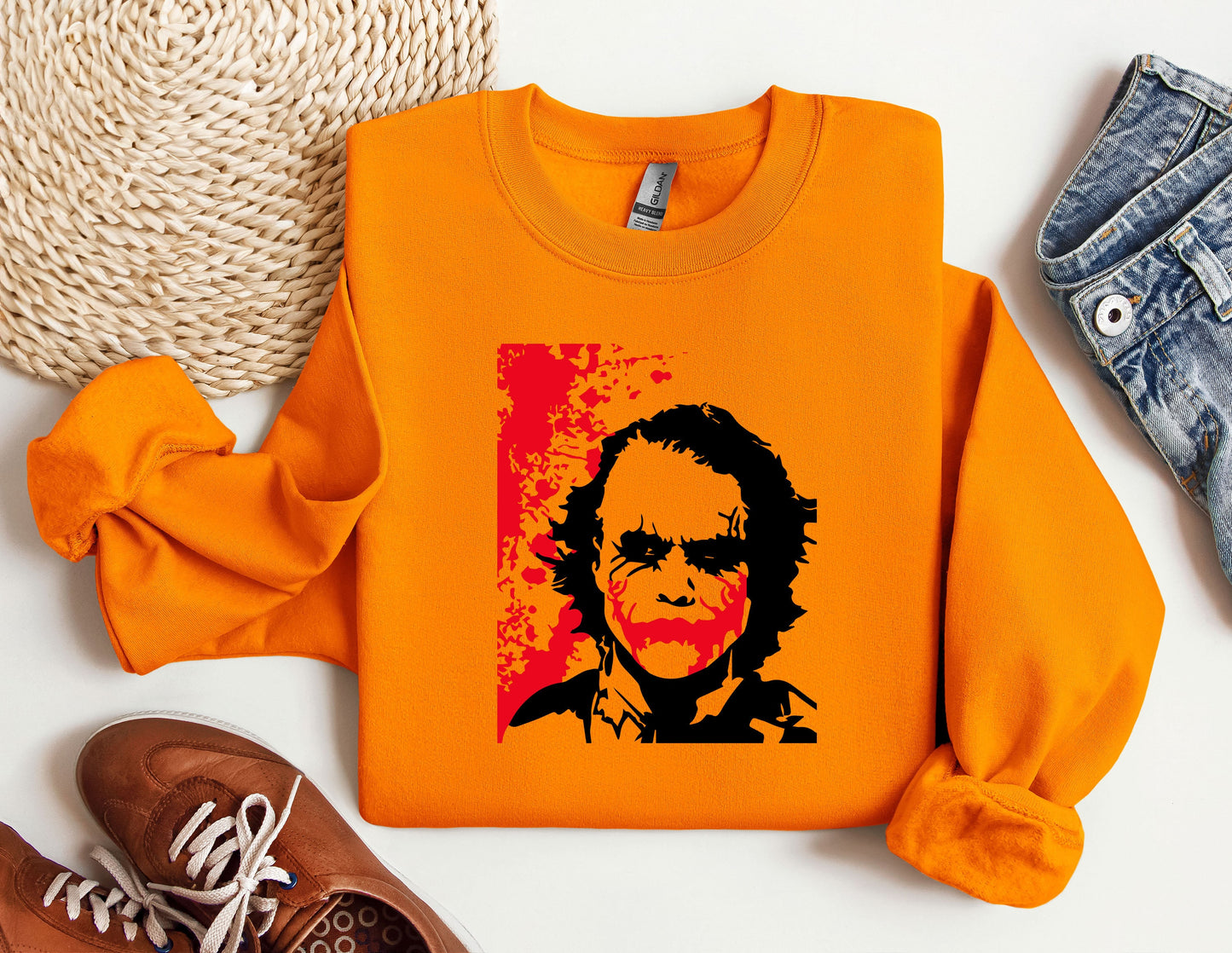 an orange shirt with a picture of a man on it