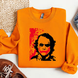 an orange shirt with a picture of a man on it