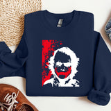 a blue sweater with a picture of a man on it