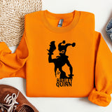 an orange shirt with a picture of a clown on it