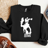 a black sweatshirt with a white graphic of a man holding a baseball bat