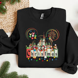 a mickey mouse christmas sweater on a table