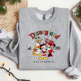a sweatshirt with a mickey mouse and friends on it