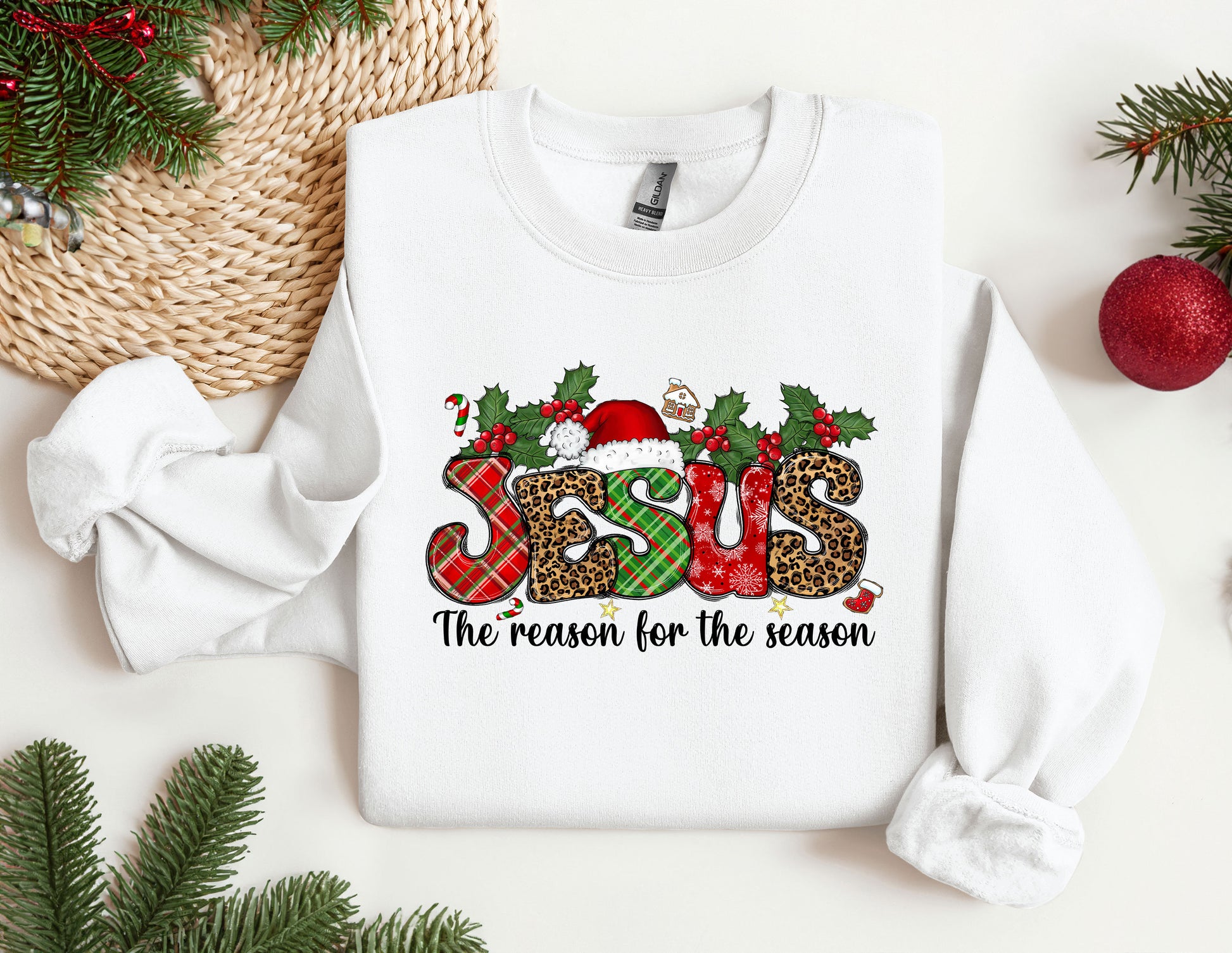 a white sweatshirt with a christmas design on it