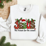 a white sweatshirt with a christmas design on it