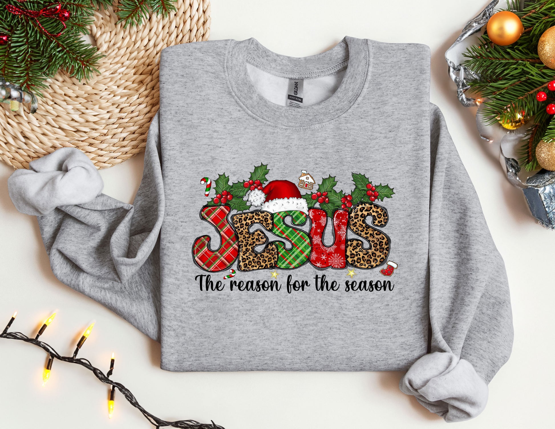 a gray sweatshirt with a christmas design on it