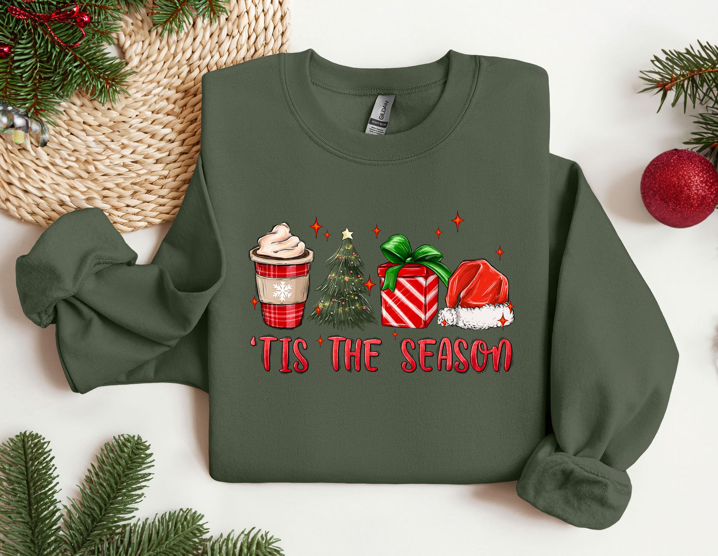 a green sweatshirt with a coffee and a christmas tree on it