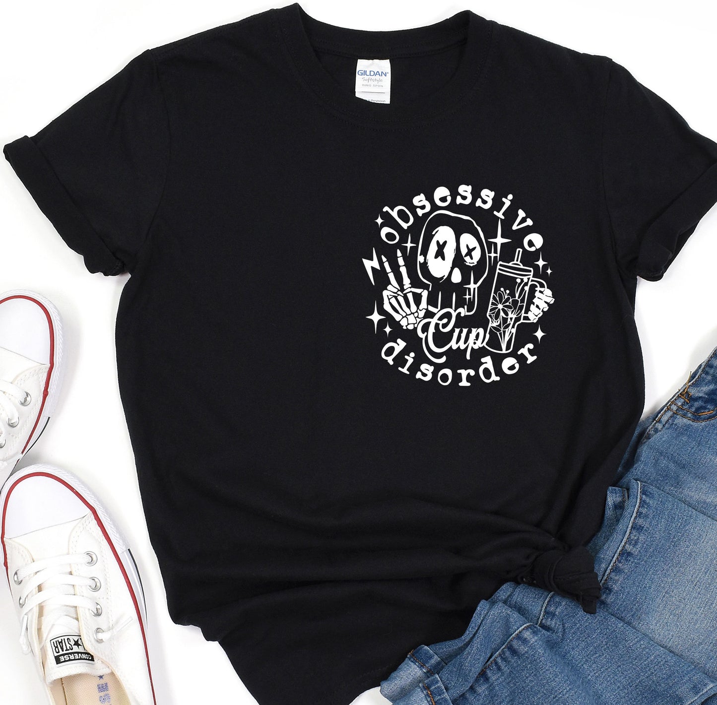 a black t - shirt with a skeleton on it