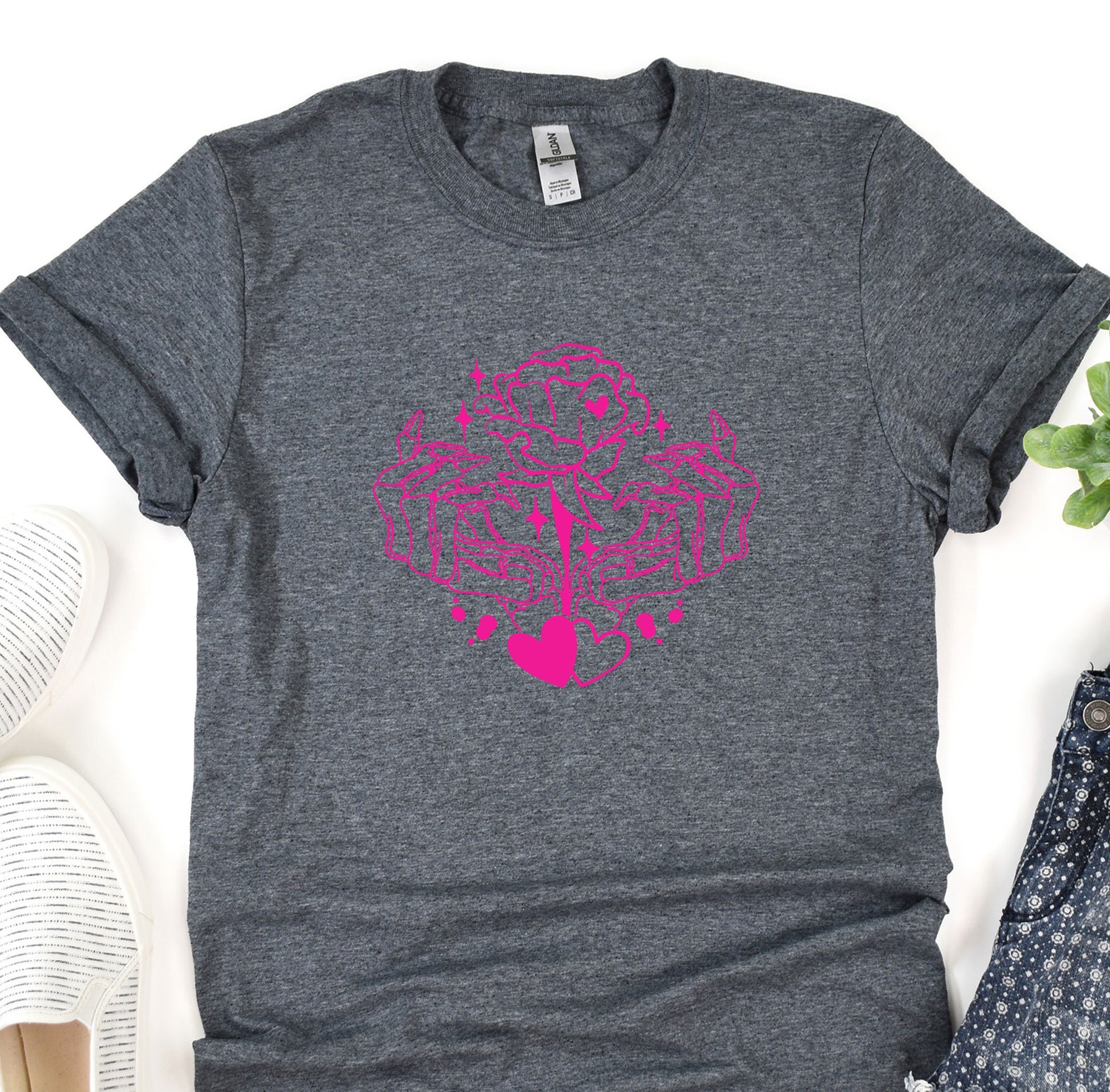 a t - shirt with a pink tree on it