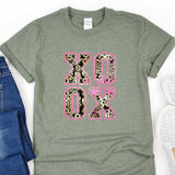 a pair of jeans and a t - shirt with a leopard print
