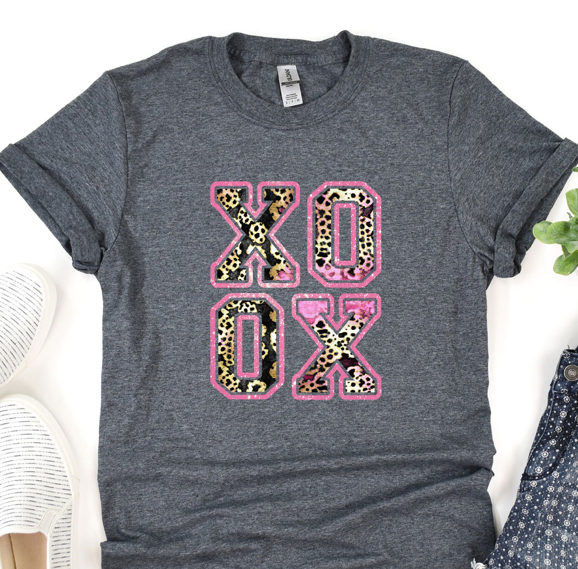 a t - shirt with the word ox oxo in leopard print