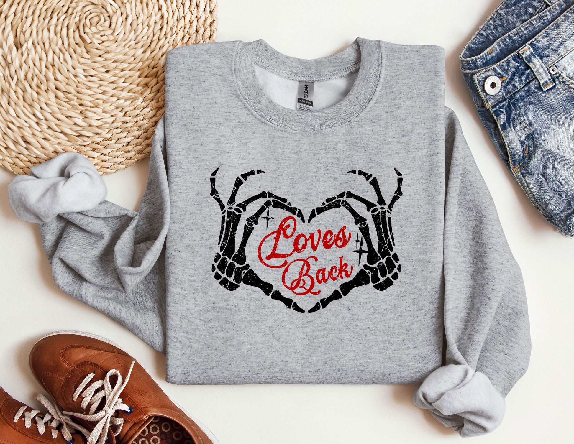 a sweatshirt with the words love&#39;s back printed on it