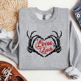 a sweatshirt with the words love's back printed on it
