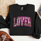 a black sweatshirt with the word love spelled in leopard print