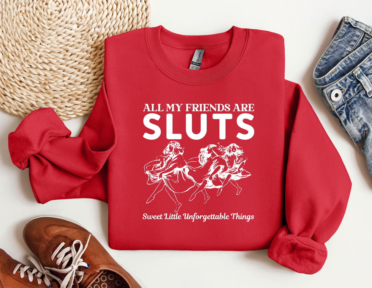 a red sweatshirt that says all my friends are sluts