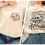 a woman wearing a sweatshirt with a skull on it
