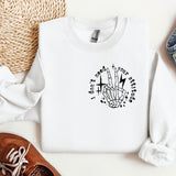 a white shirt with a black and white design on it